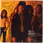 AC/DC RARE FULL BAND SIGNED "POWERAGE" PROMO ALBUM WITH BON SCOTT.