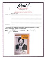 ERIC CLAPTON SIGNED PHOTO CARD.