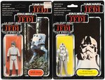 PALITOY "STAR WARS: RETURN OF THE JEDI - AT-AT DRIVER/AT-ST DRIVER" TRI-LOGO CARDED FIGURE PAIR.