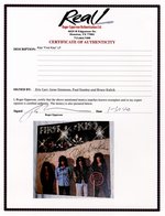 KISS SIGNED "FIRST KISS LAST LICKS" PROMO ONLY ALBUM.