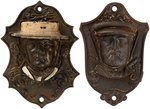GREELEY & GRANT FIGURAL WALL MOUNTED MATCH HOLDERS.