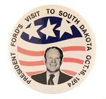 FORD VISITS SOUTH DAKOTA TWO MONTHS AFTER TAKING OFFICE BUTTON.