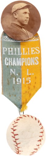 1915 "PHILLIES CHAMPIONS N.L." RIBBON W/MANAGER PAT MORAN REAL PHOTO BUTTON & 3-D BASEBALL.
