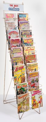 "THE BEST IN COMICS" FOLDING WIRE COMIC BOOK WALL SALES RACK.