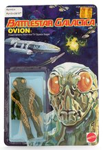 "BATTLESTAR GALACTICA - OVION" ACTION FIGURE ON CARD.