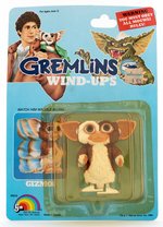 "GREMLINS WIND-UPS" GIZMO FIGURE ON CARD.