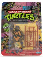 "TEENAGE MUTANT NINJA TURTLES - DONATELLO" SERIES 1 10 BACK CARDED ACTION FIGURE.