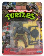 "TEENAGE MUTANT NINJA TURTLES - ROCKSTEADY" SERIES 1 10 BACK CARDED ACTION FIGURE.