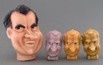 FOUR SATIRICAL NIXON BUST CANDLES.