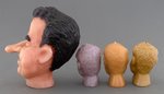 FOUR SATIRICAL NIXON BUST CANDLES.