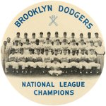 1953 BROOKLYN DODGERS "NATIONAL LEAGUE CHAMPIONS" BUTTON (CROSSED BATS VARIETY).