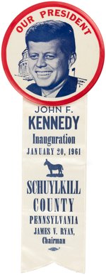 KENNEDY "OUR PRESIDENT" 4" BUTTON WITH "SCHUYLKILL COUNTY" RIBBON.