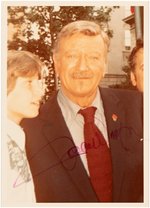 JOHN WAYNE SIGNED CANDID PHOTO.