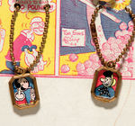 "KING FEATURES KEY CHAIN LOCKETS FULL DISPLAY.