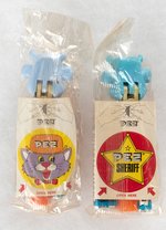 PEZ DISPENSERS IN ORIGINAL CELLO PAIR (COW "A").