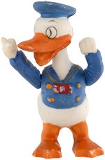 DONALD DUCK RARE BISQUE FIGURE WITH MOVEABLE ARMS.