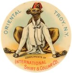 INTERNATIONAL SHIRT & COLLAR CO. CELEBRATES SHRINERS WITH SEATED CAMEL IN FORMAL ATTIRE AND FEZ.