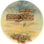 POCKET MIRROR W/BI-PLANE AND BALLOON SOARING ABOVE SUN ILLUMINATED CITY C. 1910.