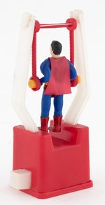 SUPERMAN TRICKY TRAPEZE PUSH BUTTON ACROBAT.