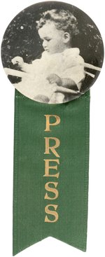 LINDBERGH BABY 1935 KIDNAPPING TRIAL BUTTON WITH HIS PHOTO AND SUSPENDED "PRESS" RIBBON.