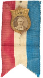 HAYES 1876 AMERICAN SHIELD BRASS SHELL PORTRAIT BADGE.