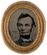 UNUSUAL LINCOLN BEARDED PORTRAIT OVAL FERROTYPE BADGE.