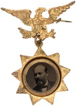 GARFIELD FEROTYPE IN ORNATE NINE POINTED STAR BRASS SHELL BADGE.