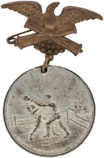 1889 BOXING SCENE (BASEBALL ALSO KNOWN) MEDAL W/HANGER FROM PHILADELPHIA MAKER OF WATERPROOF COATS.