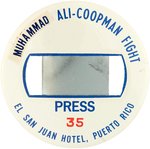 1976 ALI-COOPMAN PUERTO RICO FIGHT PRESS BUTTON WITH PAPER LABEL CORRECTION OF ERROR "MOHAMMAD" TO "MUHAMMAD".