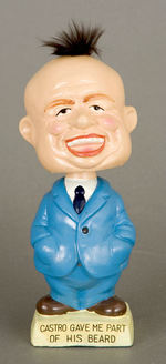 KHRUSHCHEV RARE 1960s BOBBING HEAD WITH CASTRO SLOGAN.