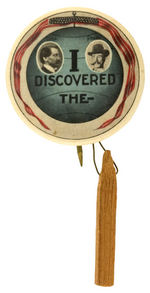 "NORTH POLE 1909 TWO EXPLORERS BUTTON WITH SYMBOLIC WOODEN POLE.