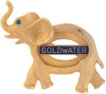 "GOLDWATER" ADVANCING ELEPHANT DIECUT FIGURAL LAPEL BADGE.