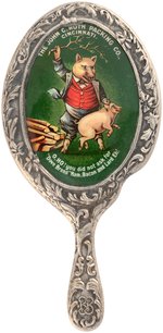 ENCASED CELLULOID HAND MIRROR WITH PIG SPANKING SCENE FOR "DOVE BRAND" HAM, BACON & LARD.