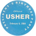 REAGAN "PRESIDENTS BIRTHDAY PARTY OFFICIAL USHER" 1984 BUTTON.