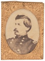 McCLELLAN UNUSUAL GEM ALBUMEN PORTRAIT IN BRASS SHELL FRAME.