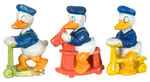 DONALD DUCK ON WHEELED APPARATUS BISQUE SET.