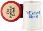 "THE NATIONAL DRINK" BUTTON WITH "WE WANT BEER" CERAMIC MUG HANGER.