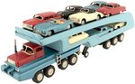 SEARS EXCLUSIVE TURNPIKE AUTO TRANSPORT FRICTION POWERED STEEL TRUCK AND NINE CARS IN BOX.