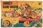 DONKEY BAND WAGON FRICTION POWERED TIN TRUCK IN BOX.