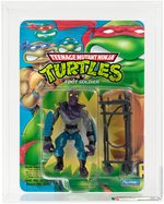 TEENAGE MUTANT NINJA TURTLES - FOOT SOLDIER SERIES 1/43 BACK AFA 85 NM+.