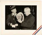 TRUMAN OVERSIZED SIGNED PHOTO INSCRIBED TO HOTEL MUEHLEBACH DOORMAN.