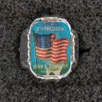 VENDING MACHINE INSERT PAPER PLUS C. 1963 MEMORIAL KENNEDY FLICKER RING.