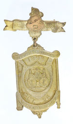 ORNATE 1893 FIRE CONVENTION BADGE.