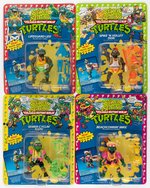 TEENAGE MUTANT NINJA TURTLES - SEWER SPITTING SET OF 4 CARDED ACTION FIGURES.