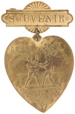 1897 "GREAT FIGHT/CORBETT & FITZSIMMONS/CARSON CITY" BRASS BADGE.