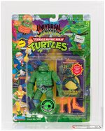 UNIVERSAL STUDIOS MONSTERS TEENAGE MUTANT NINJA TURTLES - CREATURE FROM THE BLACK LAGOON LEONARDO AFA 80 NM (ORANGE ACCESSORIES & CARD).