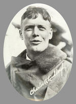 "CHARLES A. LINDBERGH" CLOSE-UP PHOTO MIRROR WITH FACSIMILE SIGNATURE.