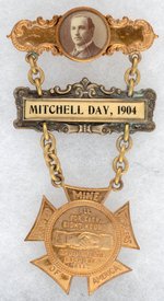 UMWA JOHN "MITCHELL DAY, 1904" EIGHT HOUR DAY LABOR BADGE.