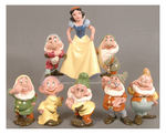 SNOW WHITE AND THE SEVEN DWARFS FIGURINE SET BY AMERICAN POTTERY.