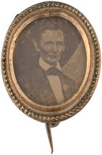 LINCOLN BRASS FRAMED ALBUMEN PORTRAIT UNDER GLASS BADGE.